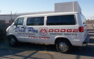 Vehicle graphics on courtesy shuttle van
